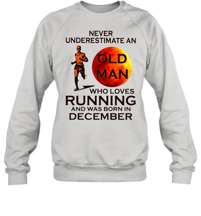 Never underestimate an old man who loves running and was born in December shirt Unisex Sweatshirt